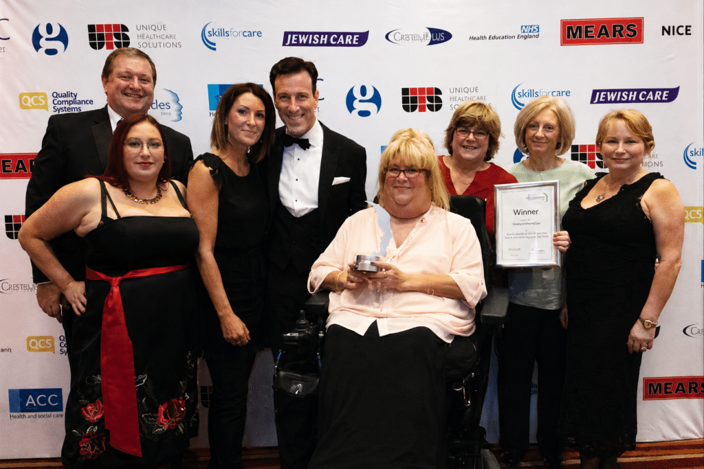 Christina Candey with her Skills for Care Accolade award for Best Individual Employer 2018, crediting Prima Cura Training staff development.